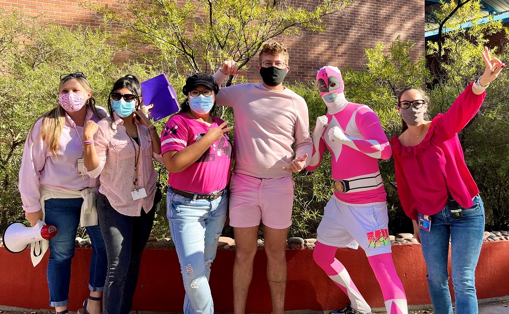 Photo of Ms. Lerma, Ms. Shelly, Ms. Sylvia, Mr. Bickley, Mr. Mutz and Mrs. Maytorena dressed in pink.